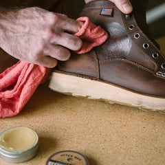Otter Wax used on a purse showing visible restoration and color enhancement benefit