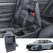 PIMCAR front view of armrest open showing hidden organizer, adds discreet storage