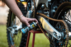 PJ1 closeup of lube being applied to chain showing precise coverage benefit