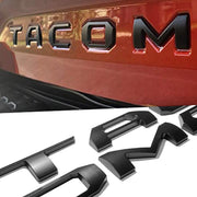 Pukonger front view of matte black tailgate letters showing exact fit and clean look
