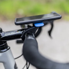 Quad Lock close-up of locking tab showing secure dual-stage safety benefit