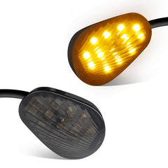 QUASCO smoked lens front view showing compact design and sleek amber signal