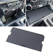 RAVOTOM front view showing cover fitted in F150 console and tidy storage benefit