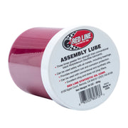 Red Line 80313 front jar showing label and 16 ounce size, protecting engine parts