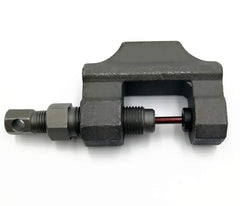 RepairWill tool beside wrench showing compact size and workshop convenience