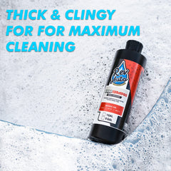 Rev Auto pouring concentrate into measuring cup demonstrating controlled dilution