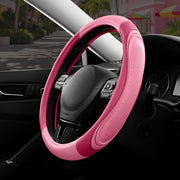 Road Comforts front packaging showing pink steering wheel cover and product benefits