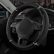 Road Comforts steering wheel cover front view showing sleek black finish and fit