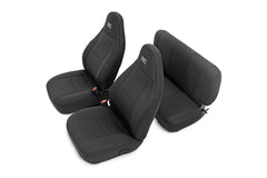 Rough Country front seat covers installed showing protective fit and renewed cabin look