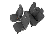 Rough Country front seat covers shown installed, protects seats from wear