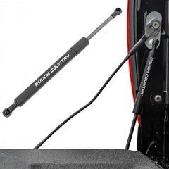 Rough Country driver-side tailgate assist front view showing secure fit and smoother drops