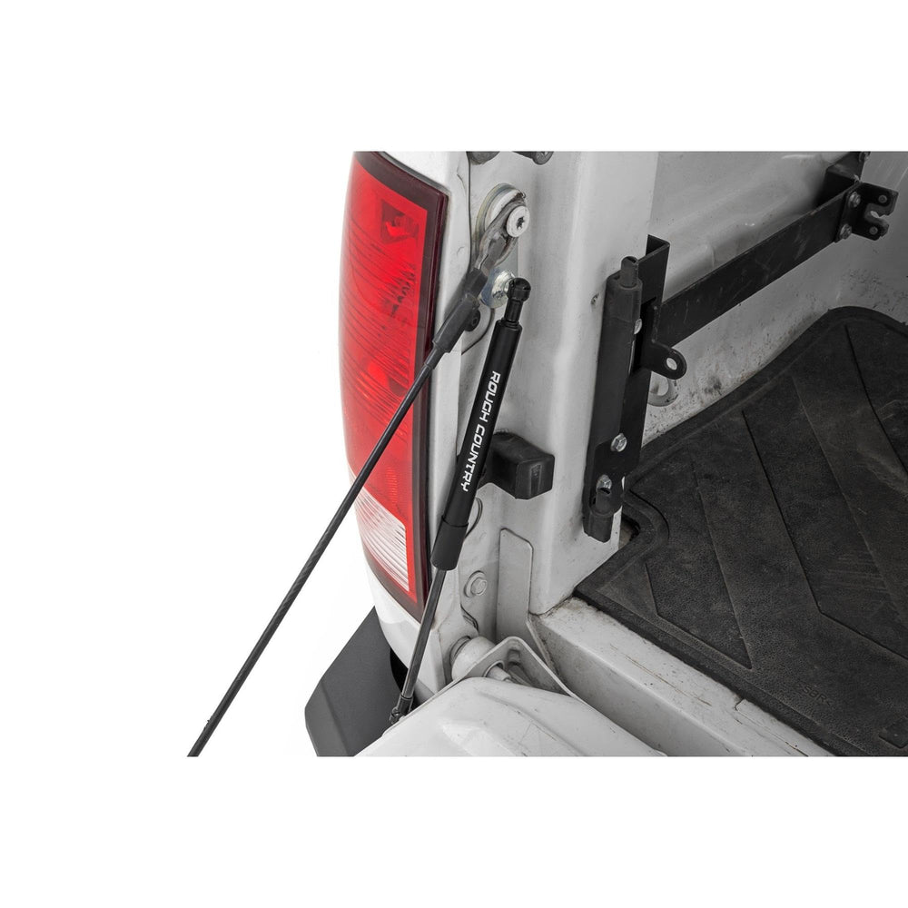Rough Country tailgate assist front-mounted on Ram truck, provides controlled lowering