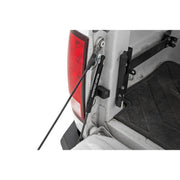 Rough Country tailgate assist front-mounted on Ram truck, provides controlled lowering