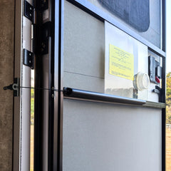 Safoner front view of mounted closer showing clean black finish and easy fit
