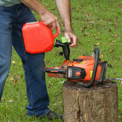 Scepter funnel stored on ring next to can for tidy storage and spill prevention