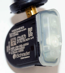Schrader valve stem detail showing mounting hardware and secure seal benefit