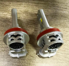 SEALIGHT H11 bulb beside a halogen for size comparison and 1:1 fit