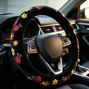 SHIAWASENA front view of steering wheel cover packaging showcasing design and fit benefit