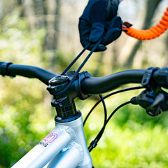 SHOTGUN rope in use with adult towing child on trail showing easier riding