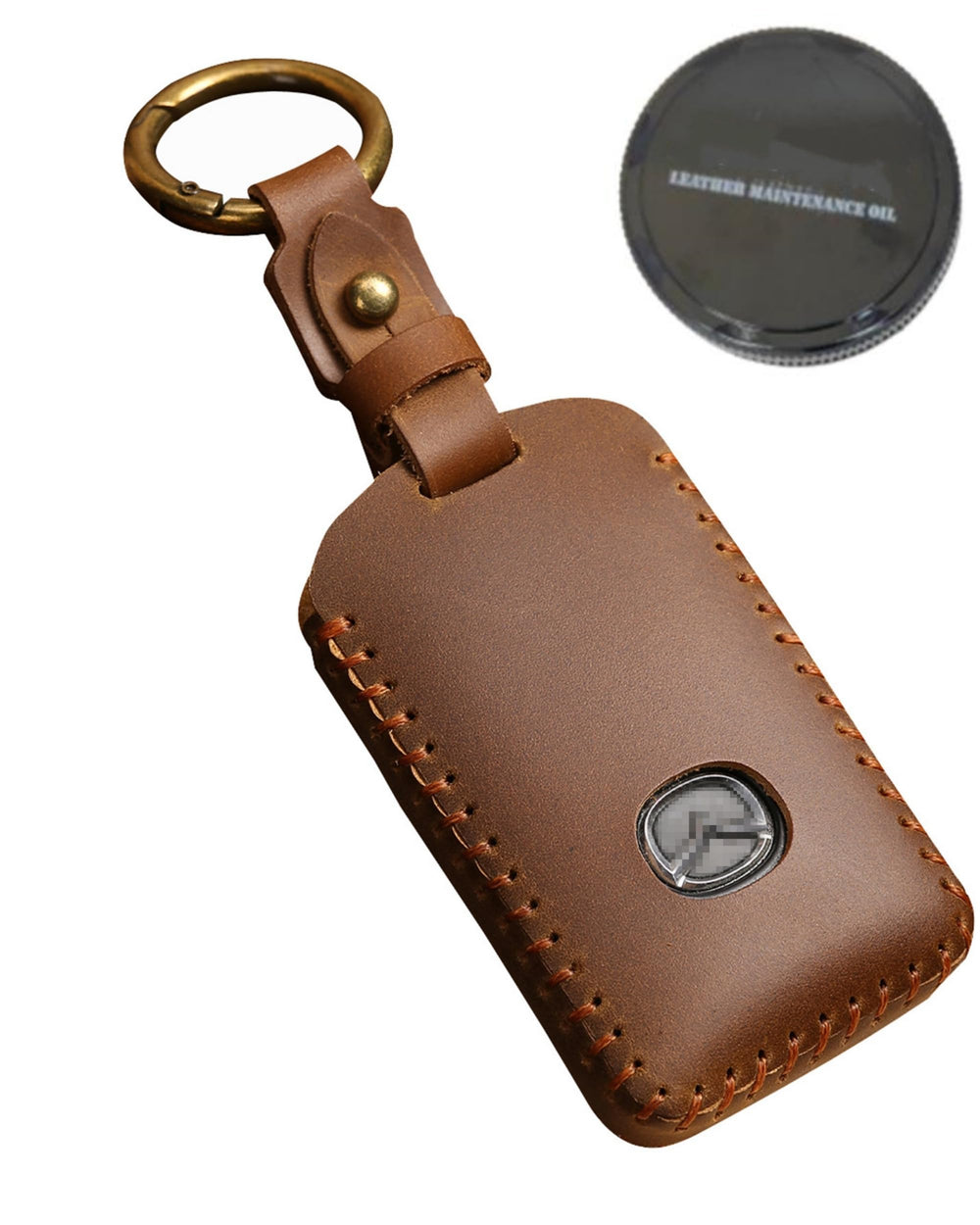 SIEVEN brown leather key fob case front view showing neat fit and polish benefit