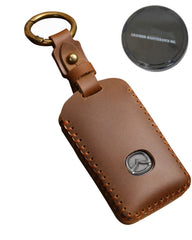 SIEVEN brown leather key fob case front view showing neat fit and polish benefit