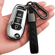 Sindeda front view showing silver cover and button access, protects remote