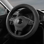 Skechers front view of packaged steering wheel cover showing sleek black styling and brand