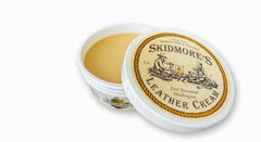 Skidmore's front packaging 6 oz tin showing label and size benefit