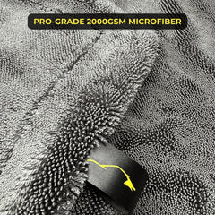 Sleek Dudes towel spread on car hood demonstrating large coverage benefit