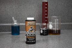 Spectro Oil cap and bottle texture close-up showing spill-resistant design benefit