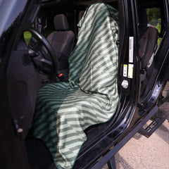 Sprints towel beside gym bag to show full-sized dimensions and easy packability