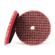 SPTA wool pad front view showing secure hook-and-loop backing and fit