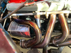 SWI heat shield close-up detail showing aluminum and fiberglass layers benefit durability