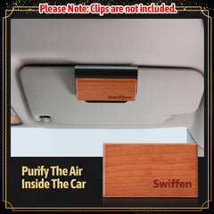Swiffen on sun visor clip in use demonstrating simple installation and steady fragrance