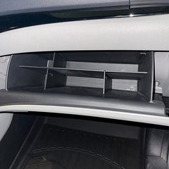 TACOBRO lower compartment detail holding owner's manual and larger items securely