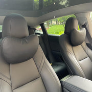 TANOLA TESBEAUTY front view of both black Nappa leather headrest pillows showing clean design and fit