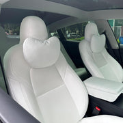TANOLA TESBEAUTY front view showing white headrest pair, premium look and fit