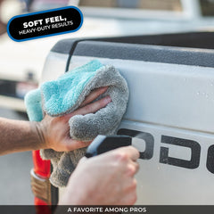 Towel wiping a car door with The Rag Company showing quick water removal benefit