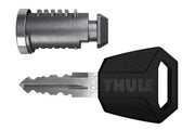 Thule front packaging showing two lock cylinders and one key offering easy replacements