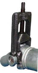 Tiger Tool in use on a driveshaft demonstrating safe, controlled extraction benefit