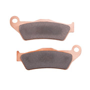 TUSK close-up of sintered front brake pad showing compound and improved stopping