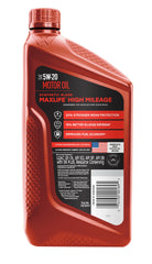 Valvoline MaxLife being poured from bottle illustrating easy pour spout