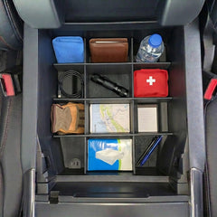 Vehicle OCD side profile in console showing snug fit preventing rattles while driving