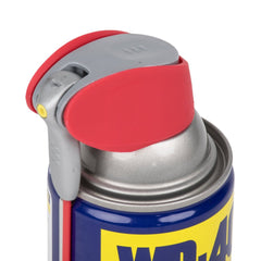 WD-40 straw flipped up delivering a precision stream to loosen a tight hinge