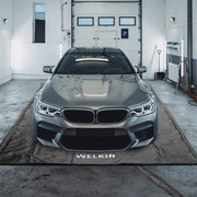 WELKIN front view of full mat protecting garage floor