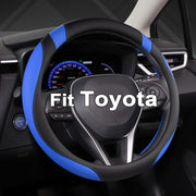 West Llama front view of black and blue steering wheel cover showing fit and style benefit