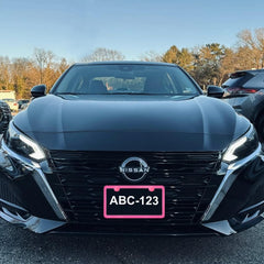 Yogrvner frame installed on car front for stylish personalization
