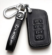 ZERAL key fob front view showing precise button cutouts and sleek black finish