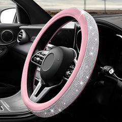ZNDAW front view of white and pink diamond steering wheel cover showing sparkle and style