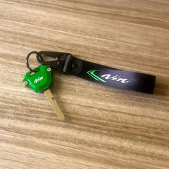 ZYAKOMO key case installed on key close-up improving grip and shielding buttons